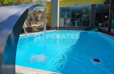 399m² em capim macio – 4 suítes, piscina, varanda gourmet e anexo versátil
