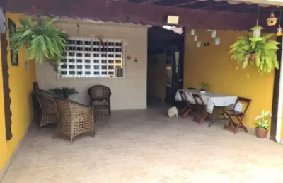 Casa individual em praia grande! 400 metros da praia!