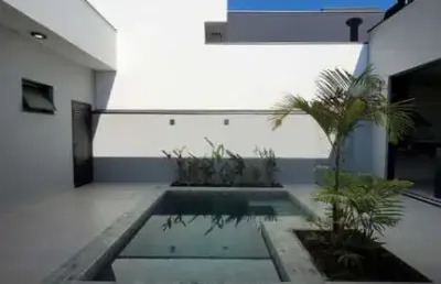 Linda casa térrea com três suítes e piscina no condomínio jardim laguna em indaiatuba.
