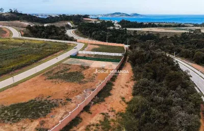 Terreno alphaville três praias à venda, 675,40 m² por r$ 1.000.000 - alphaville três praias - guarapari/es