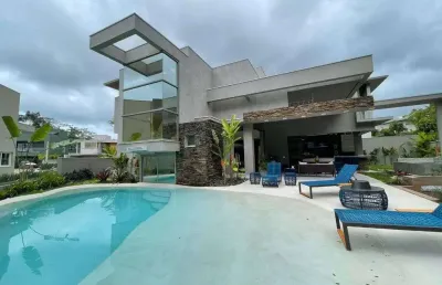 Casa com 5 dormitórios, 526 m² - venda por r$ 8.500.000,00 ou aluguel por r$ 5.000,00/dia - riviera módulo 24 - bertioga/sp