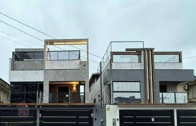 Sobrado com 3 dormitórios à venda, 162 m² por r$ 1.480.000 -  guilhermina - praia grande/sp