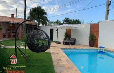 Casa isolada com piscina e espaço gourmet  3 dormitórios mais dependência à venda, 220 m² por r$ 1.300.000  balneário flórida  praia grande sp