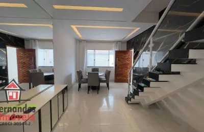 Belíssimo sobrado mobiliado e planejado 100 metros da praia  com 3 suítes à venda, 129 m² por r$ 970.000  ocian  praia grande sp