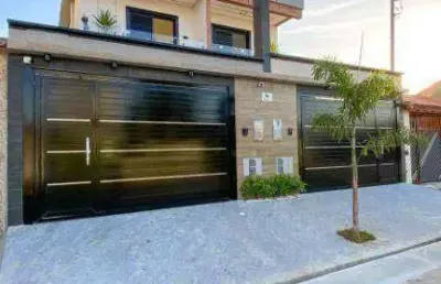 Sobrado com 3 dormitórios 300 metros da praia à venda por r$ 890.000 - maracanã - praia grande/sp