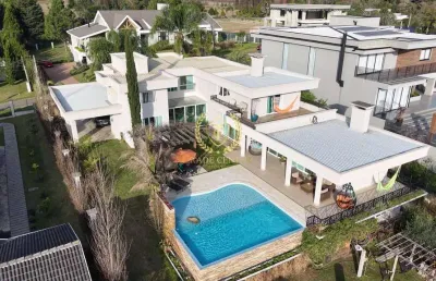 Casa térrea estilo minimalista, no condomínio haras bom pastor