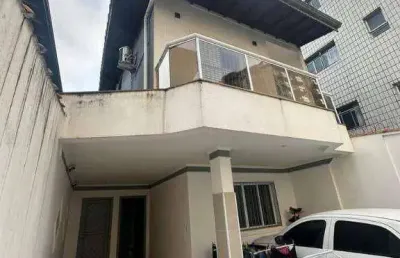 Sobrado com 3 dormitórios à venda, 125 m² por r$ 650.000 - caiçara - praia grande/sp