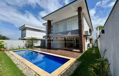 Belíssima mansão com piscina e acabamentos de alto padrão no melhor de alphaville litoral norte iii