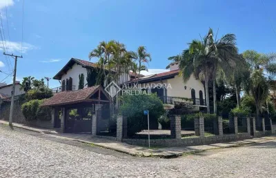 Casa com 5 quartos à venda na carlos hofstatter, 161, centro, montenegro, 623 m2 por r$ 1.998.000