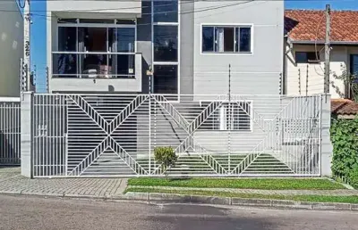 Belíssima residência de 3 quartos, sendo 1 suite no campo comprido.