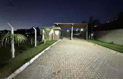 Lote a venda de 1500m2 em condomínio fechado colina do sol por 220 mil
