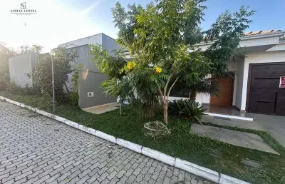Casa linear em condomínio fechado com três quartos suítes a venda por 1.379.000,00