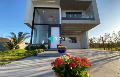 Casa em condomínio fechado com 5 quartos à venda na rio das camisas, 101, remanso, xangri-lá por r$ 2.490.000