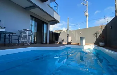 Belissimo sobrado de alto padrão á 70 metros da praia do cascalho.