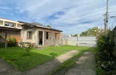 Casa em camboriú com espaço amplo na frente com 3 quartos bairro santa regina!!
