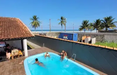 Casa com piscina a venda em frente a praia  em , mongaguá/sp