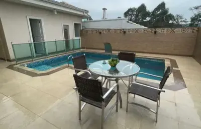 Condomínio aruã - casa à venda no condomínio aruã - 4 suítes, piscina e espaço gourmet