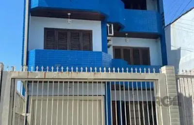 Casa 420m², 4 dormitórios, 3 vagas no bairro partenon