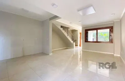 Casa com 3 quartos à venda na Rua Ronaldo Molina de Quadros, 420, Mário Quintana, Porto Alegre