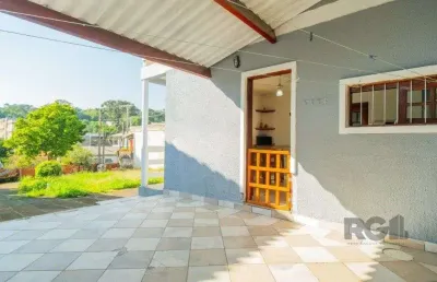 Casa com 3 quartos à venda na Rua Mathilde Zatar, 87, Nonoai, Porto Alegre