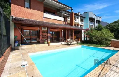 Casa com 4 dormitórios, sendo 1 suíte, com 2 vagas cobertas, no bairro nonoai, p