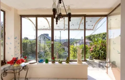 Casa com 2 quartos à venda na Rua Oscar Tollens, 242, Santa Tereza, Porto Alegre