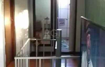 Casa com 4 quartos à venda na Beco dos Rossatos, 65, Campo Novo, Porto Alegre