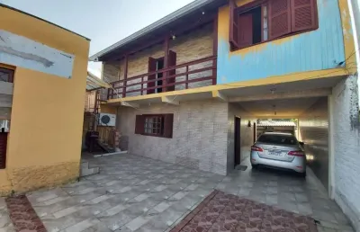 Casa com 3 quartos à venda na Rua Império, 130, Vila Nova, Porto Alegre