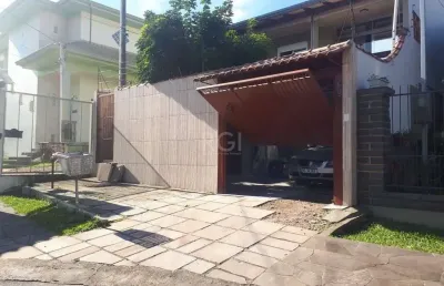 Casa com 3 quartos à venda na Rua José Pereira da Cunha, 49, Vila Nova, Porto Alegre