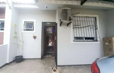 Casa com 2 quartos à venda na Rua Milton Dos Santos Martins, 41, Restinga, Porto Alegre