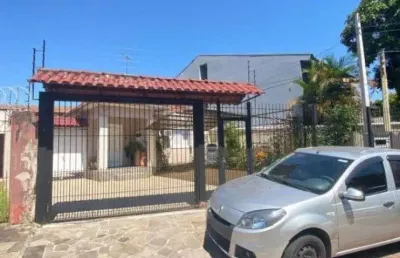 Casa 4 dormitórios i vaga 8 carros i bairro camaquã