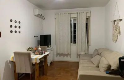 Apartamento de 2 dormitórios, living, cozinha, área de serviço e banheiro social