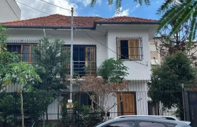 Casa de 4 dormitórios no bairro santo antônio, porto alegre