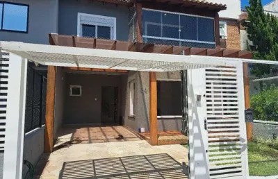 Casa com 3 quartos à venda na Rua Aldo Sani, 84, Hípica, Porto Alegre