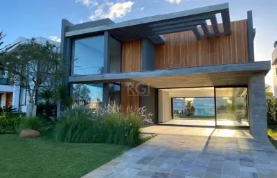 Casa em condomínio 4 dormitórios à venda centro xangri-lá/rs