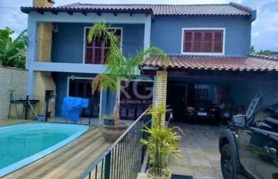 Casa com 4 quartos à venda na Rua Pistoia, 39, Rio Branco, Canoas