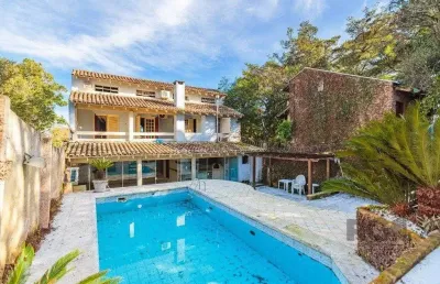 Casa com 3 quartos à venda na Rua Alcebíades Antônio dos Santos, 178, Nonoai, Porto Alegre
