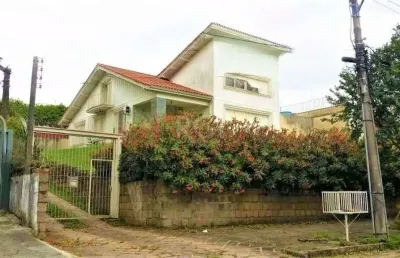 Casa com 3 quartos à venda na Rua Felipe Becker, 159, Três Figueiras, Porto Alegre