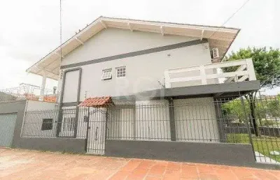 Casa para venda - 238.35m², 4 dormitórios, sendo 1 suites, 2 vagas - nonoai
