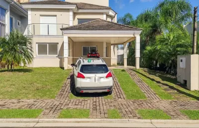 Casa em condomínio fechado com 3 quartos à venda na Rua Taínhas, 472, Alphaville, Gravataí
