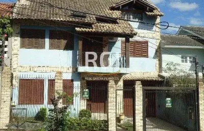 Casa à venda – 320m², 3 dormitórios (1 suíte), 5 vagas – partenon