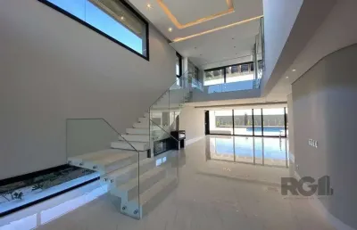 Casa para comprar no condomínio ponta da figueira - marina com 4 suítes