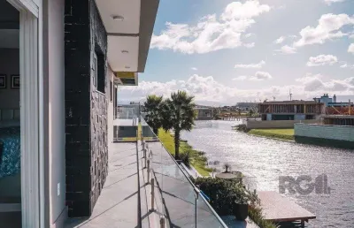 Casa em condomínio 5 dormitórios à venda centro xangri-lá/rs