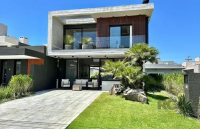 Casa em condomínio 4 dormitórios à venda centro xangri-lá/rs