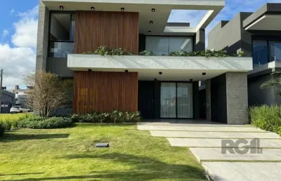 Casa em condomínio 4 dormitórios à venda centro xangri-lá/rs