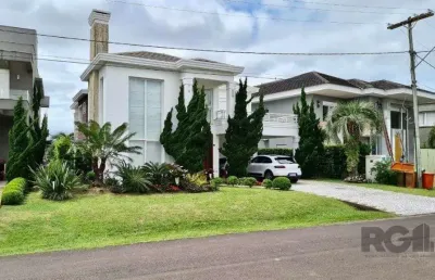 Casa em condomínio 4 dormitórios à venda atlântida xangri-lá/rs