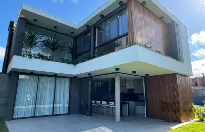 Casa em condomínio 4 dormitórios à venda centro xangri-lá/rs