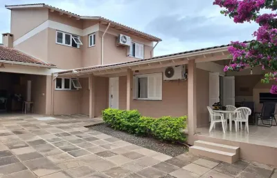 Casa com 3 quartos à venda na Rua César de Castro, 163, Teresópolis, Porto Alegre