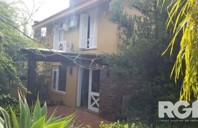 Casa em condomínio fechado com 3 quartos à venda na Rua Professor Carlos de Paula Couto, 500, Cavalhada, Porto Alegre