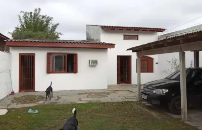 Casa de 3 dormitórios  a venda no bairro ponta grossa - porto alegre